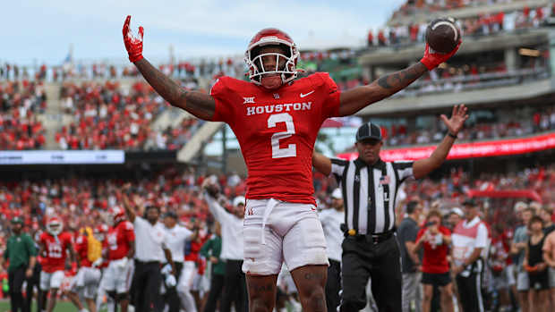 Oct 21, 2023; Houston, Texas, USA; Houston Cougars wide receiver Matthew Golden (2) celebrates after scoring a touchdown during the third quarter against the Texas Longhorns at TDECU Stadium.